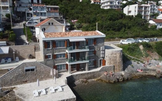 For sale seafront stone house with three apartments in Krasici